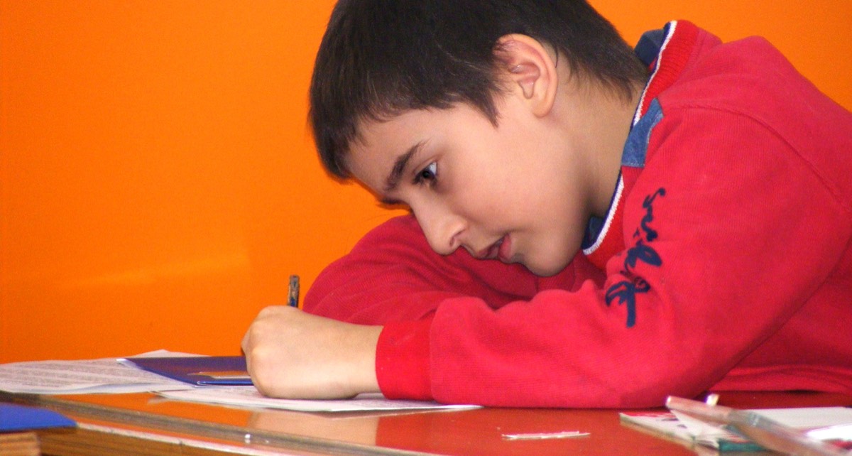 Copil implicat într-o activitate educațională Diaconia